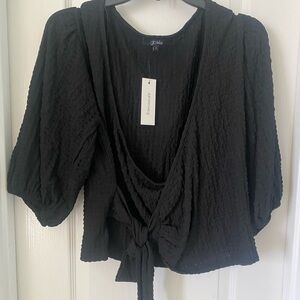 Women’s black wrap top
